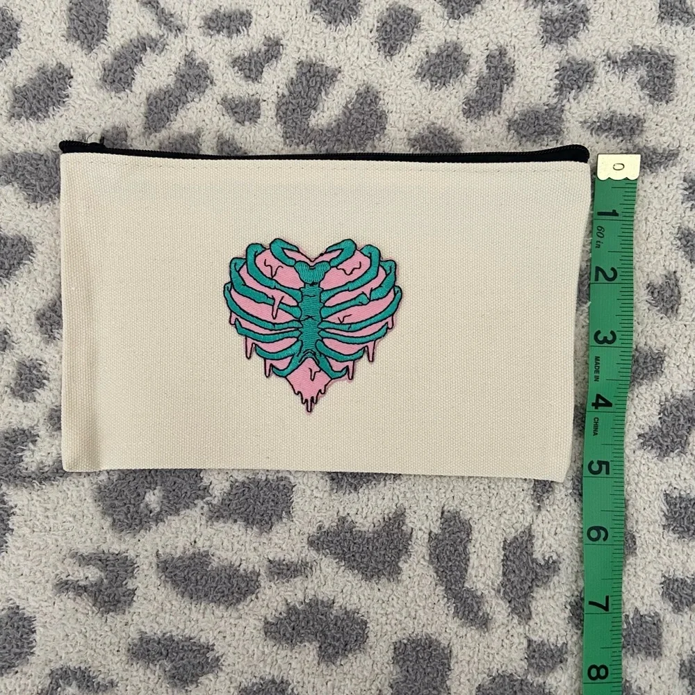 HANDMADE COSMETICS BAG WITH RIBCAGE PATCH - Picture 4 of 4